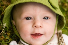 Baby with green hat