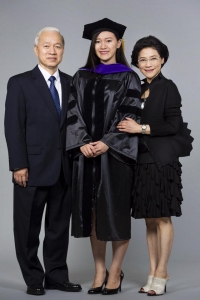Portrait of graduate and family