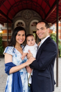 Father mother and baby son at baptism