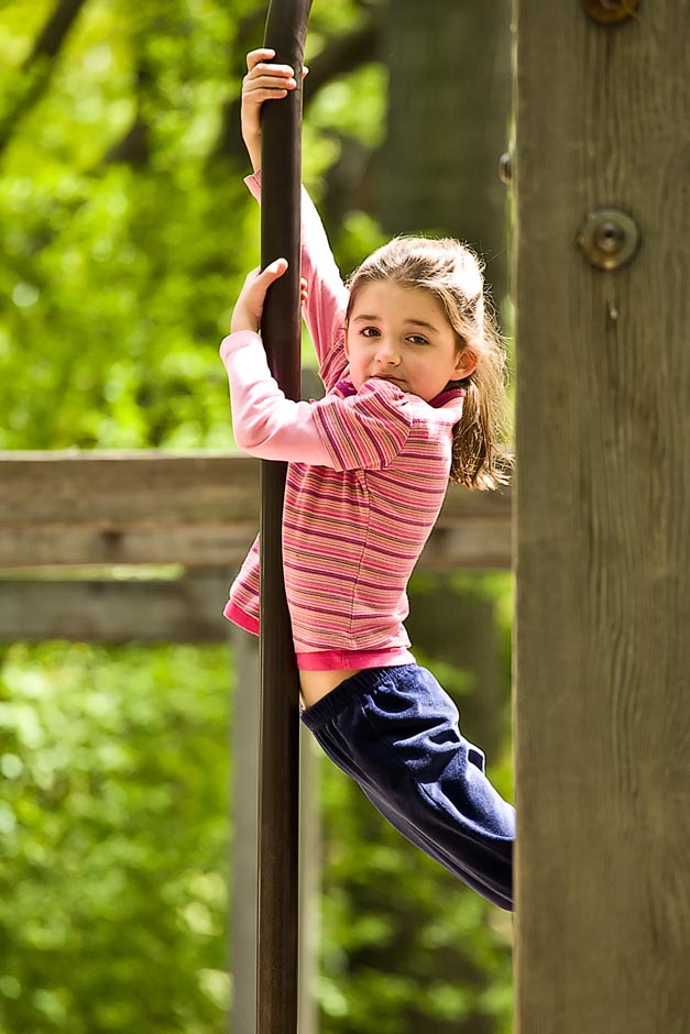 Sliding down the playground pole