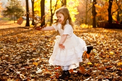 girl-in-central-park-autumn-leaves