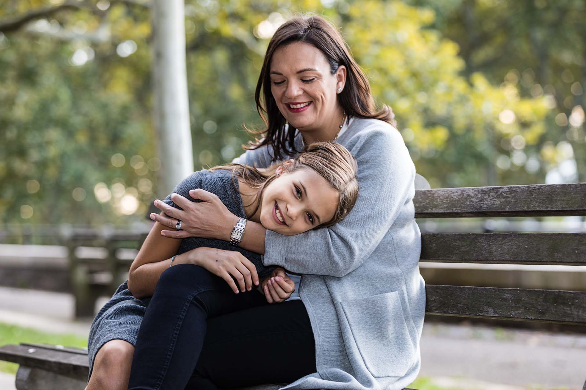 Mother-and-daughter-on-park-bench