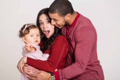 NYC-family-portrait-studio-mom-making-faces-at-baby