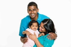 studio-portrait-mom-dad-baby