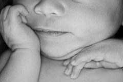 B&W closeup portrait of newborn