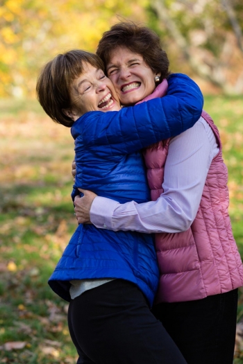 Hugging Sisters in Central Park in Autumn